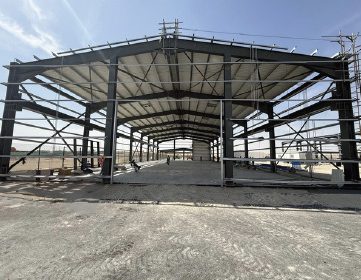 Interior view of a long steel frame building