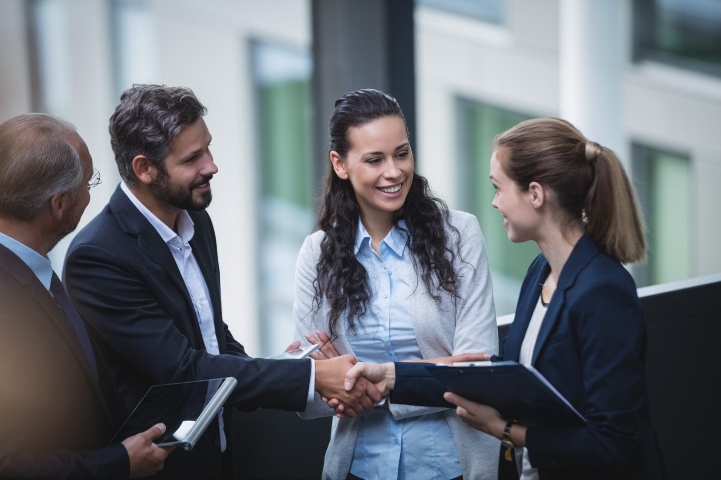 Business partners shaking hands